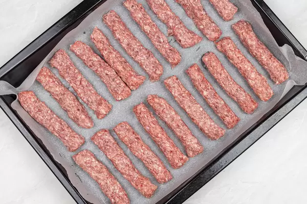 Top view of Raw Kebabs on the baking tray