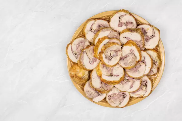 Top view of Rolled Chicken Meat served on the plate