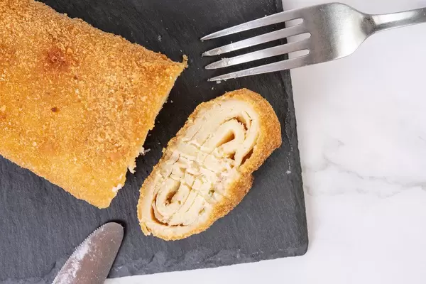 Top View of Stuffed Pancake with Cheese and Ham (Flip 2019)