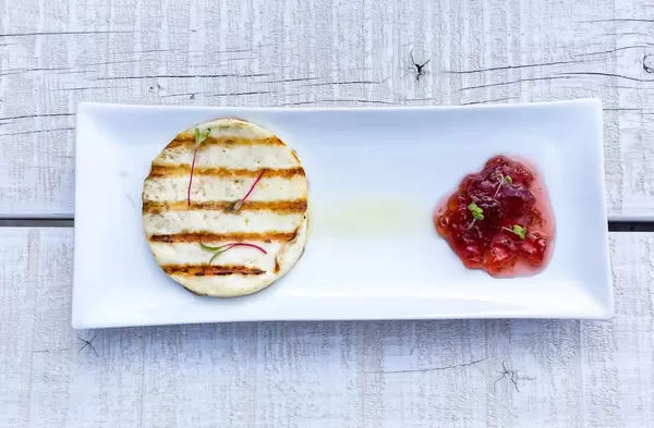 Top view of Talagani cheese with fruit marmalade