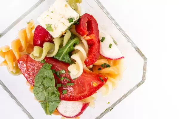 Top view of Tomato Radishes Rukola and Cheese salad (Flip 2019)
