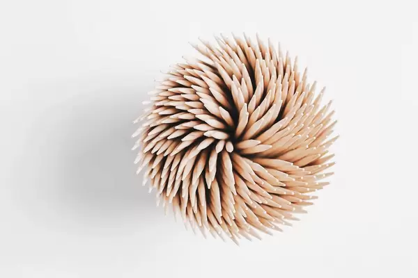 Top view of toothpicks on white background