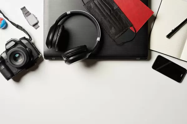 Top view of travel stuff on white background