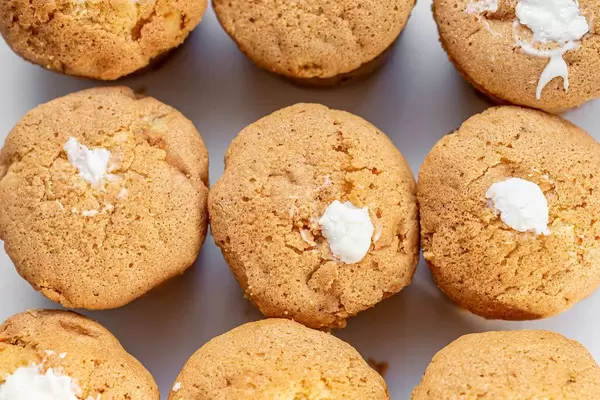 Top view of white cream cupcakes (Flip 2019)