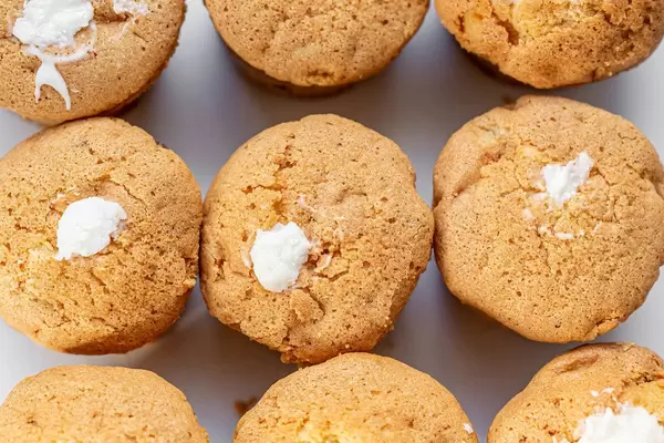 Top view of white cream cupcakes