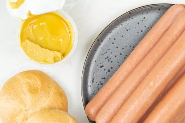 Top view of Wienerwurst with Mustard