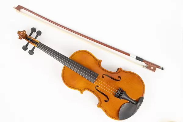 Top view of wooden Violin with Fiddle Bow