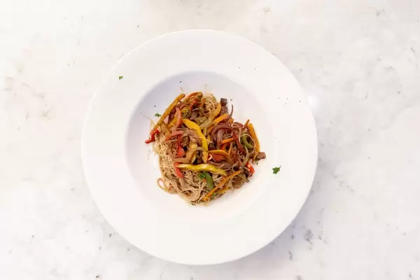 Top View on a vegan wok noodle meal