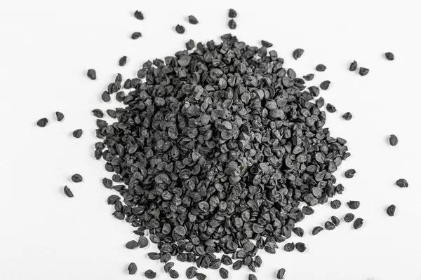 Top view, onion seeds for growing micro-greenery on a white background