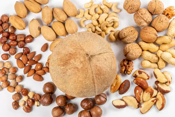 Top view, peeled nuts and nuts with shells of different types