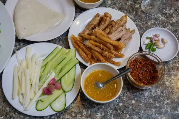 Top View Photo of Grilled Pork with Rice Paper, Vegetables and Peanut Sauce