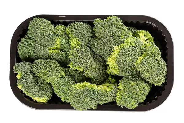 Top view, pieces of raw fresh broccoli