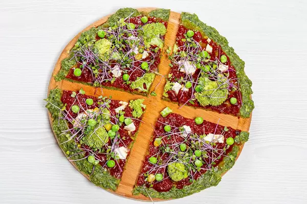 Top view pizza with vegetables and micro greens cabbage
