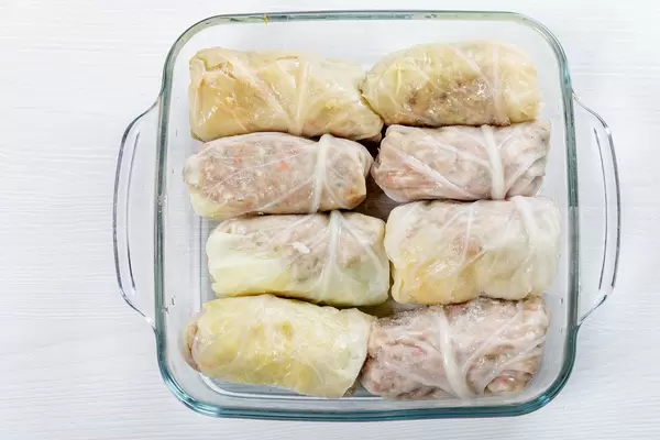 Top view raw cabbage rolls in glass baking pan (Flip 2019)