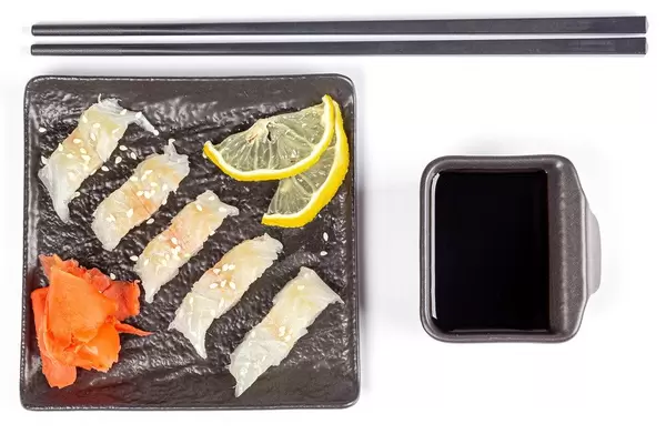 Top view, sashimi from fresh fish with sauce