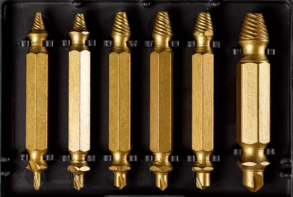 Top view, set of HSS drills on black