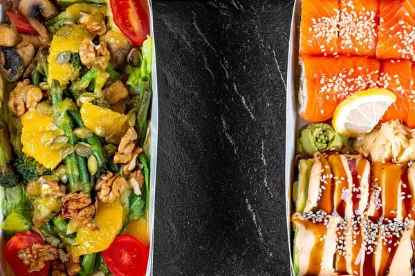 Top view, set of sushi and salad in boxes on a black background