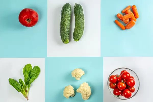 Top view, vegetarian food on blue and white background
