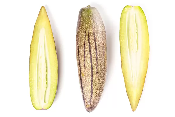 Top view, whole and cut in half fruit pepino