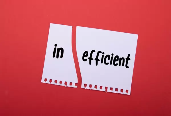 Torn paper with Inefficient text on red background