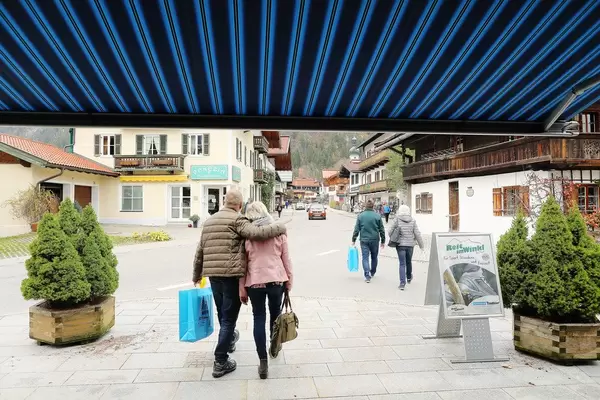 Tourists walking in Reit im Winkl, German village
