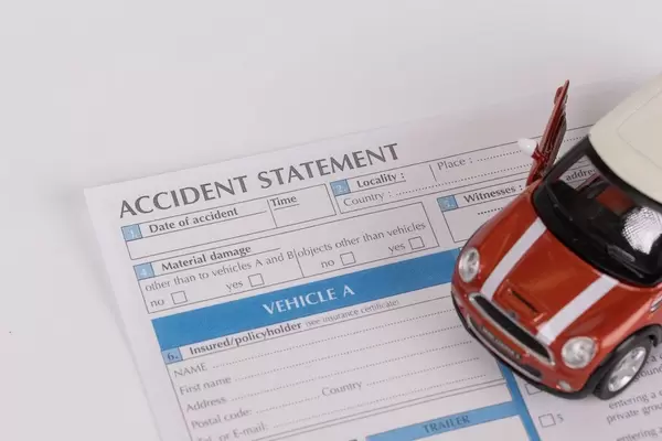 Toy car on accident statement report