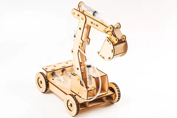 Toy constructor-excavator made of wooden parts