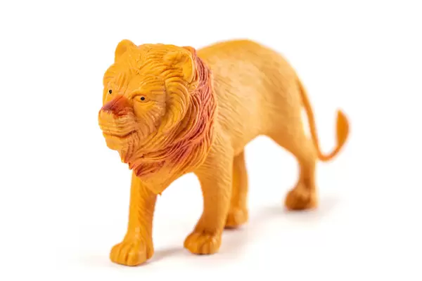 Toy figurine of a predatory animal lion