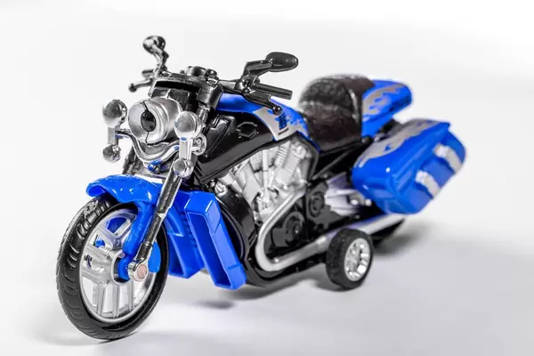 Toy motorcycle on white background