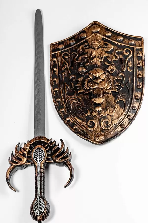 Toy shield and sword on white background (Flip 2019)