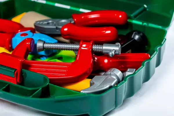 Toy tools on a light background. Children's toys  Flip 2019
