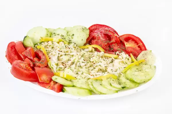 Traditional Salad with sliced Cabbage Tomato Cucumber and Paprika (Flip 2019)
