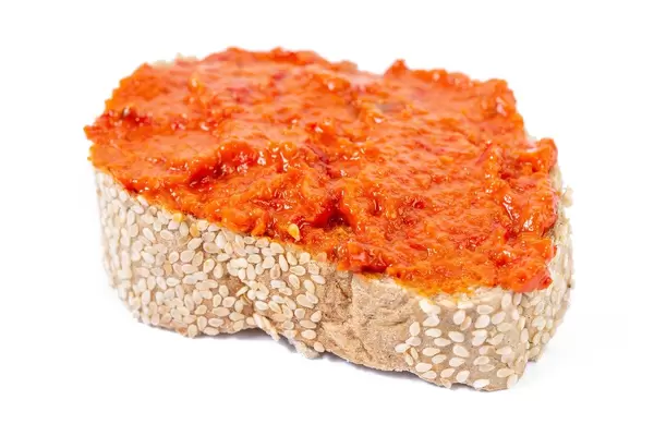 Traditional Serbian Ajvar spreaded on the bread (Flip 2019)