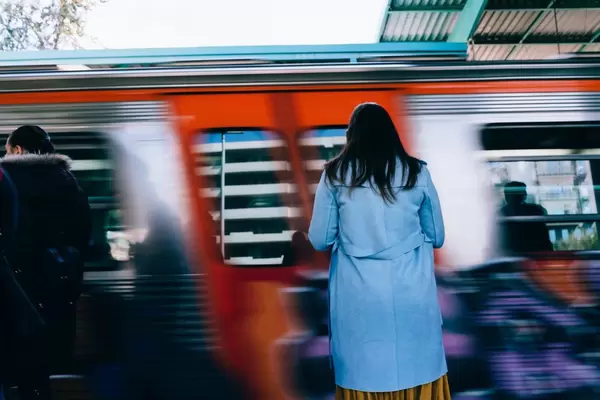 Train running by a passenger