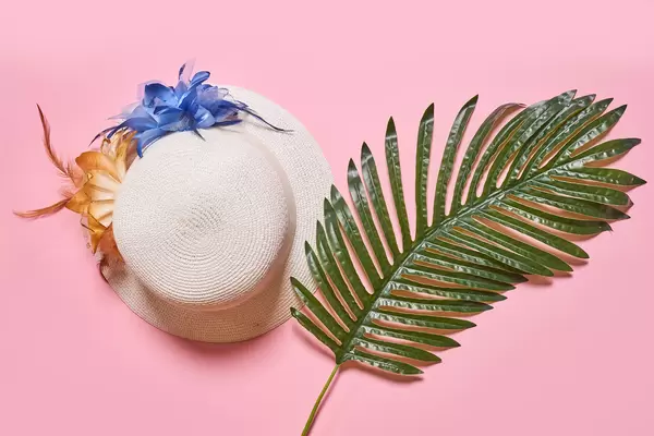 Tropical leaf and female's summer hat