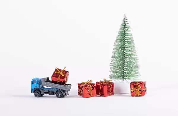 Truck delivering gifts to the Christmas tree