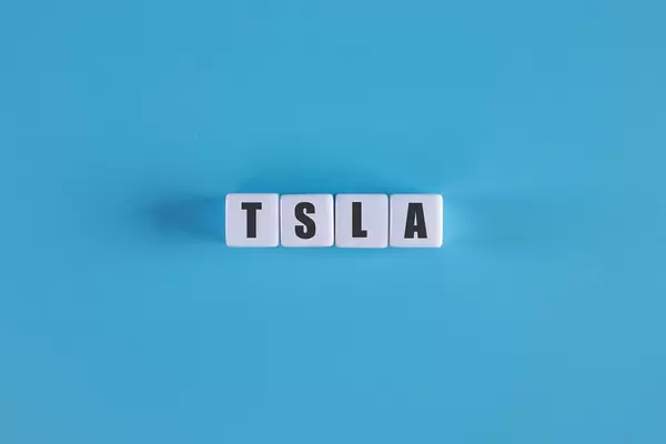 TSLA text on white cubes