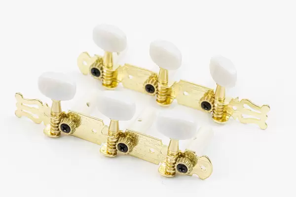 Tuning Pegs for Acoustic guitar isolated above white background
