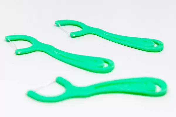 Türkisfarbene Zahnseide-Sticks