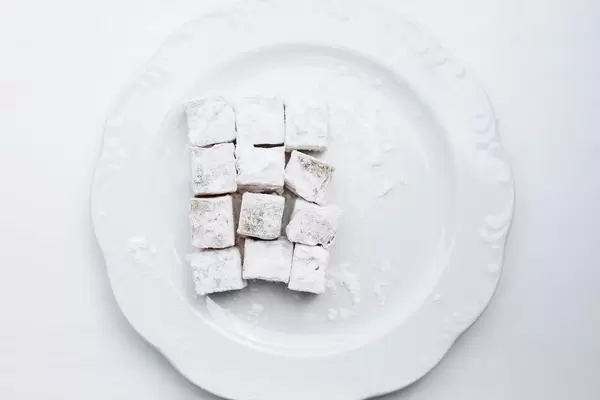 Turkish delight in a white plate. Top view.