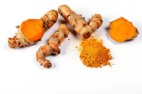 Turmeric and turmeric powder on white background (Flip 2020)