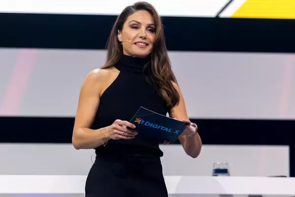 TV celebrity Nazan Eckes dressed in black on the stage of the Digital X event in Cologne