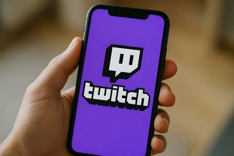 Twitch mobile app on smartphone with purple background