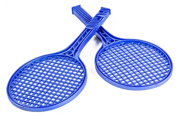 Two blue tennis rackets on white background