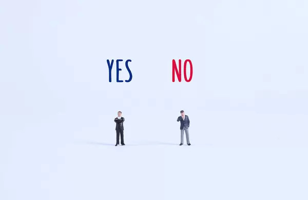 Two businessman with Yes and No text