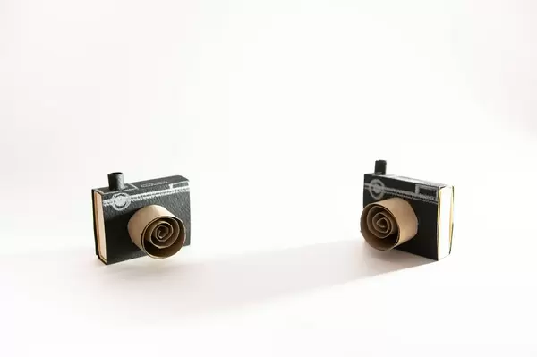 Two camera crafts looking toward each other