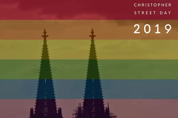 Two church towers behind rainbow colours and picture title Christopher Street Day 2019
