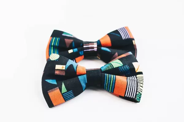 Two colorful bow ties on white background