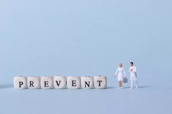 Two doctors with Prevent text