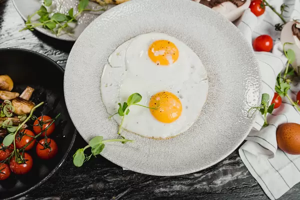 Two Eggs With Tomatoes Background Food Photography